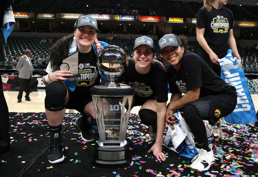 Iowa Hawkeyes seniors Megan Gustafson, Hannah Stewart, and Tania Davis celebrate their victory over the Maryland Terrapins in the Big Ten Championship Game Sunday, March 10, 2019 at Bankers Life Fieldhouse in Indianapolis, Ind. (Brian Ray/hawkeyesports.com)