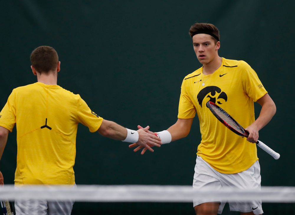 Iowa's Jake Jacoby and Joe Tyler play a doubles match against Creighton 