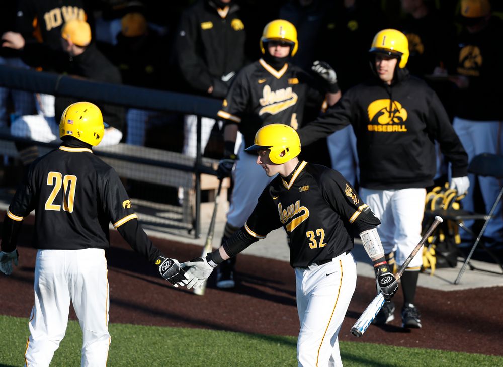 Iowa Hawkeyes catcher Austin Guzzo (20) and catcher Brett McCleary (32) against Grand View Wednesday, April 4, 2018 at Duane Banks Field. (Brian Ray/hawkeyesports.com)