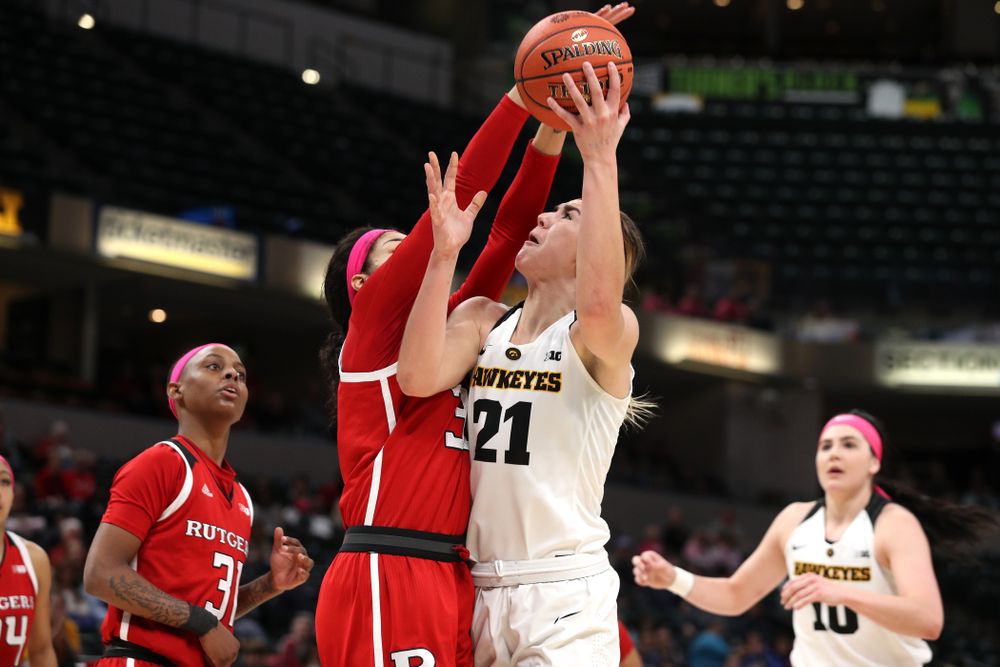 Iowa Hawkeyes forward Hannah Stewart (21) against the Rutgers Scarlet Knights in the semi-finals of the Big Ten Tournament Saturday, March 9, 2019 at Bankers Life Fieldhouse in Indianapolis, Ind. (Brian Ray/hawkeyesports.com)