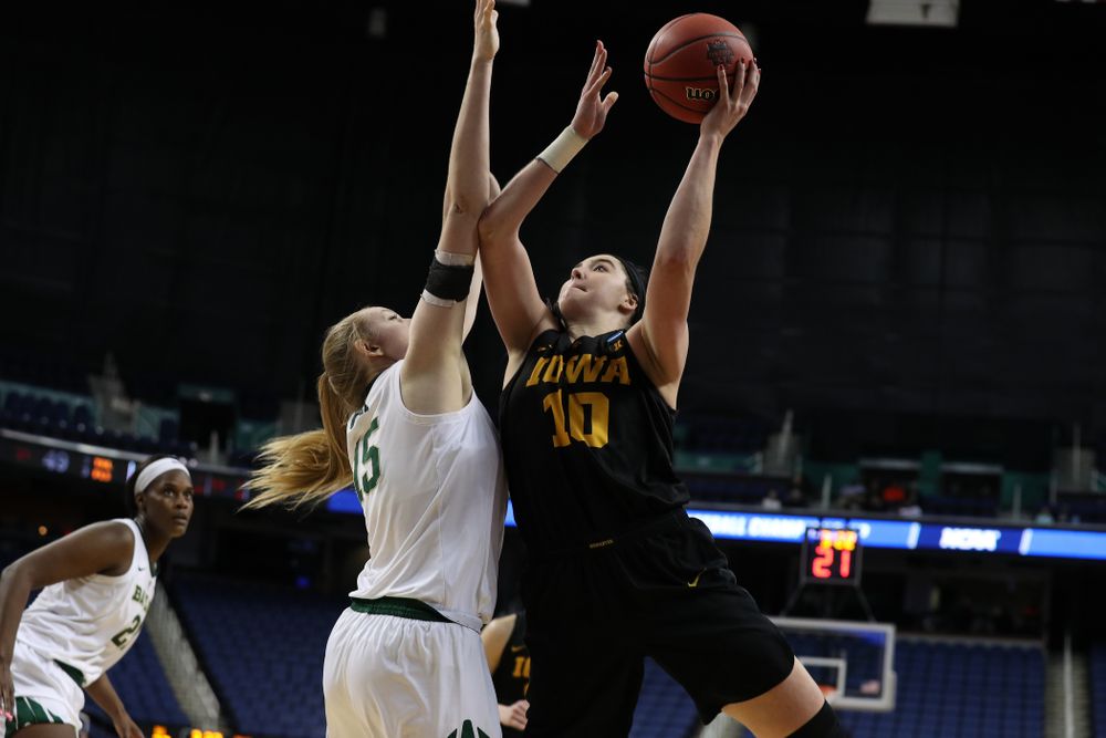 Iowa Hawkeyes forward Megan Gustafson (10) scores her 1,000th point of the year in the regional final against the Baylor Lady Bears in the 2019 NCAA Women's College Basketball Tournament Monday, April 1, 2019 at Greensboro Coliseum in Greensboro, NC.(Brian Ray/hawkeyesports.com)