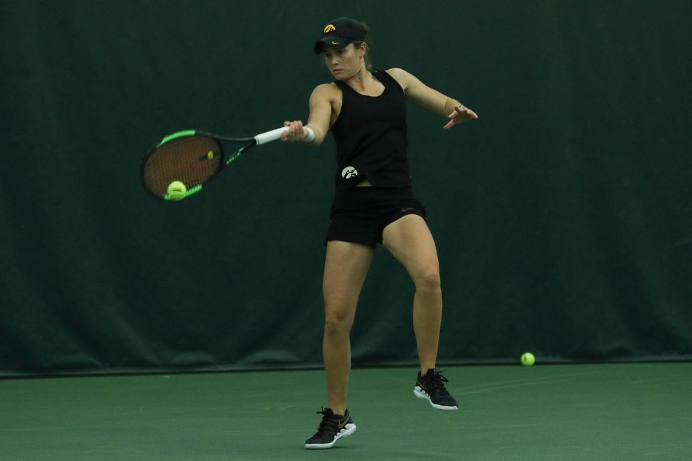 Iowa’s Elise van Heuvelen during the Iowa women’s tennis meet vs DePaul  on Friday, February 21, 2020 at the Hawkeye Tennis and Recreation Complex. (Lily Smith/hawkeyesports.com)