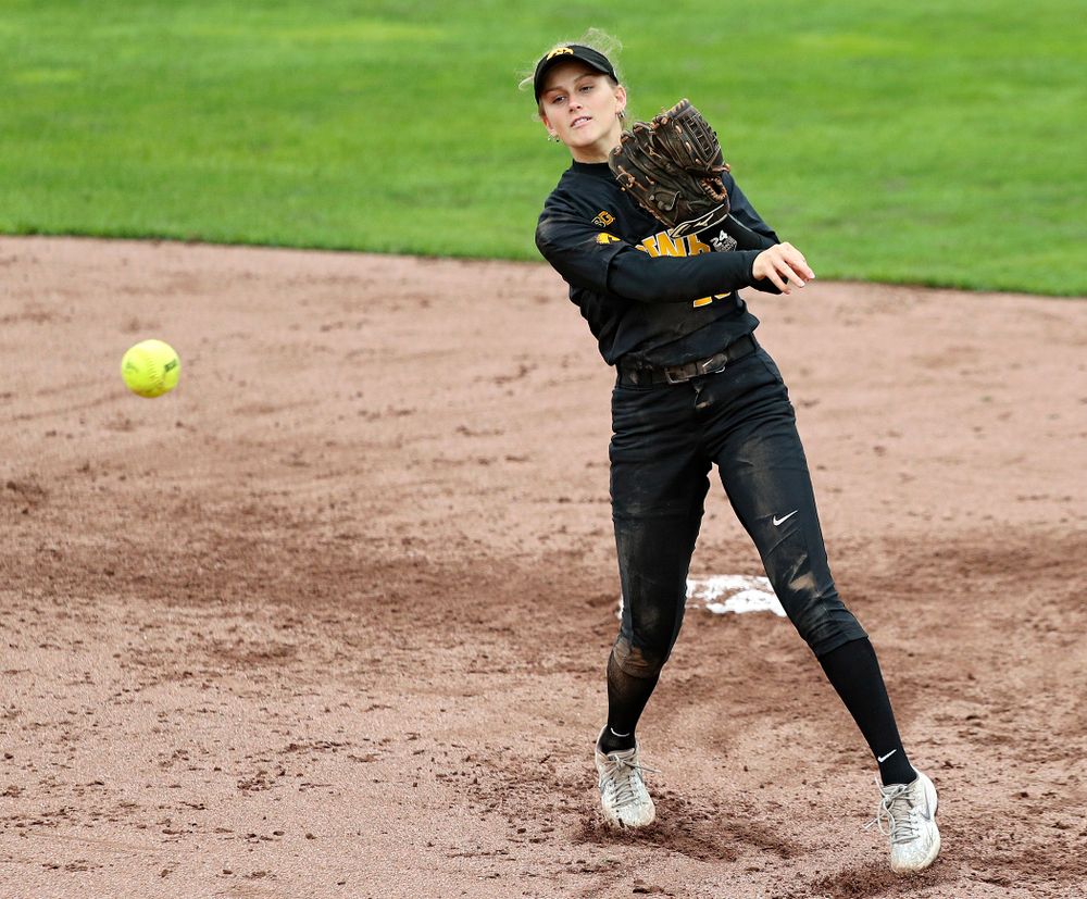 Iowa infielder Mia Ruther (26) throws to first for an out during the sixth inning of their game against Iowa Softball vs Indian Hills Community College at Pearl Field in Iowa City on Sunday, Oct 6, 2019. (Stephen Mally/hawkeyesports.com)