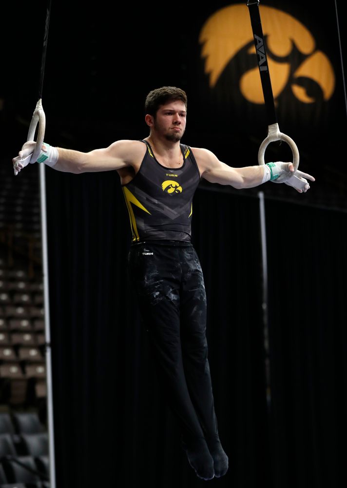 Rogelio Vazquez competes on the rings against Minnesota and Air Force 