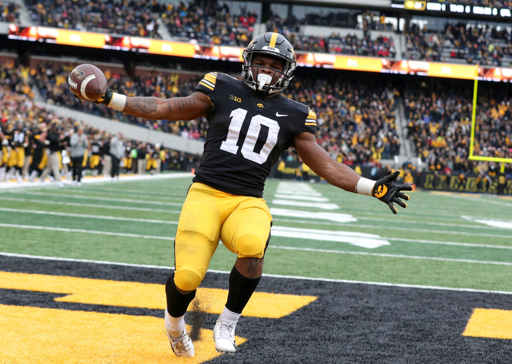 Iowa Hawkeyes running back Mekhi Sargent (10) scores against the Nebraska Cornhuskers Friday, November 23, 2018 at Kinnick Stadium. (Brian Ray/hawkeyesports.com)