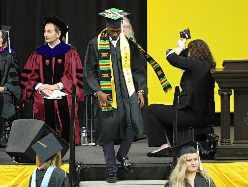 Iowa Track and Field’s Karayme Bartley during the College of Liberal Arts and Sciences and University College Fall 2019 Commencement ceremony at Carver-Hawkeye Arena in Iowa City on Saturday, December 21, 2019. (Stephen Mally/hawkeyesports.com)