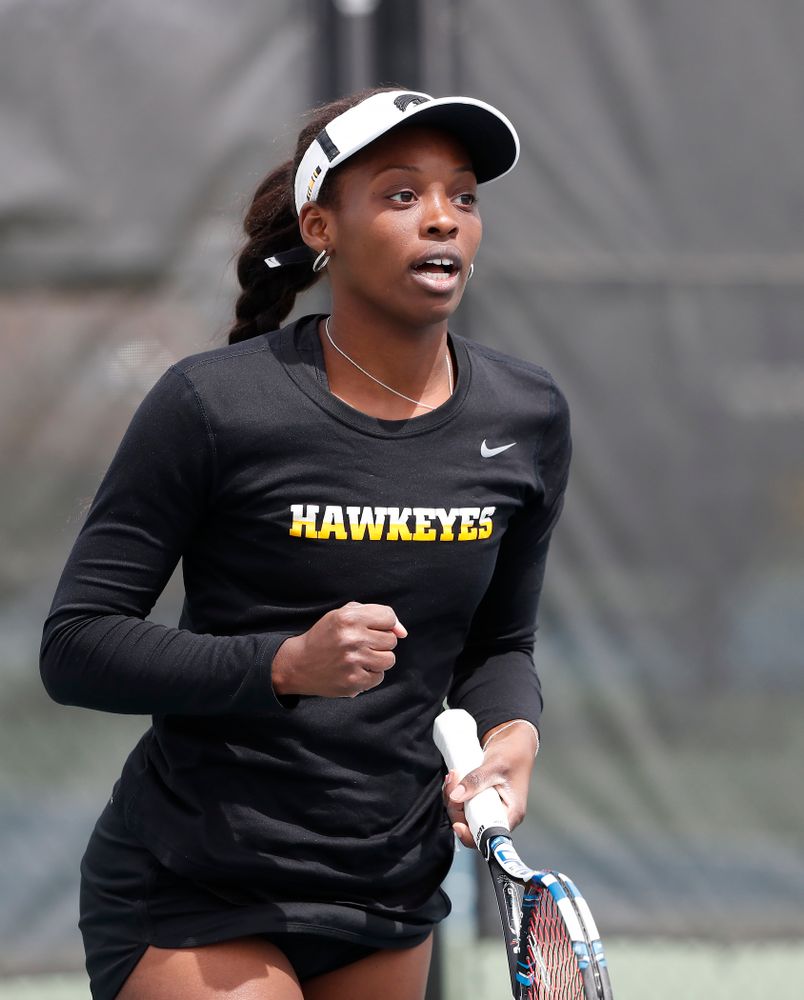 Adorabol Huckleby and Zoe Douglas play a doubles match against the Wisconsin Badgers Sunday, April 22, 2018 at the Hawkeye Tennis and Recreation Center. (Brian Ray/hawkeyesports.com)