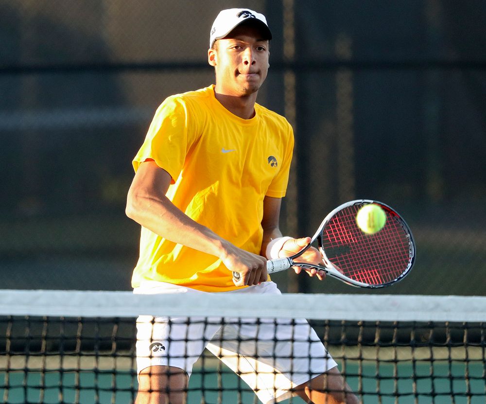 Iowa's Oliver Okonkwo during his match again Michigan State at the Hawkeye Tennis and Recreation Complex in Iowa City on Friday, Apr. 19, 2019. (Stephen Mally/hawkeyesports.com)
