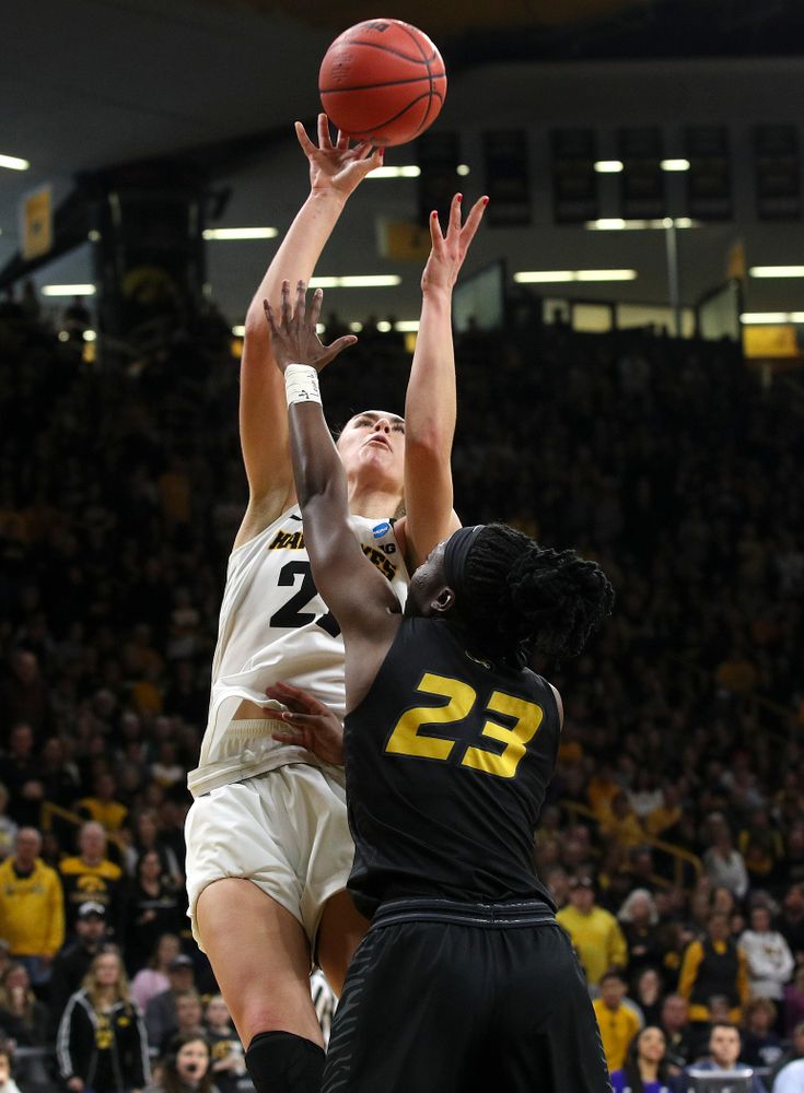Iowa Hawkeyes forward Hannah Stewart (21) scores a basket during the third quarter of their second round game in the 2019 NCAA Women's Basketball Tournament at Carver Hawkeye Arena in Iowa City on Sunday, Mar. 24, 2019. (Stephen Mally for hawkeyesports.com)