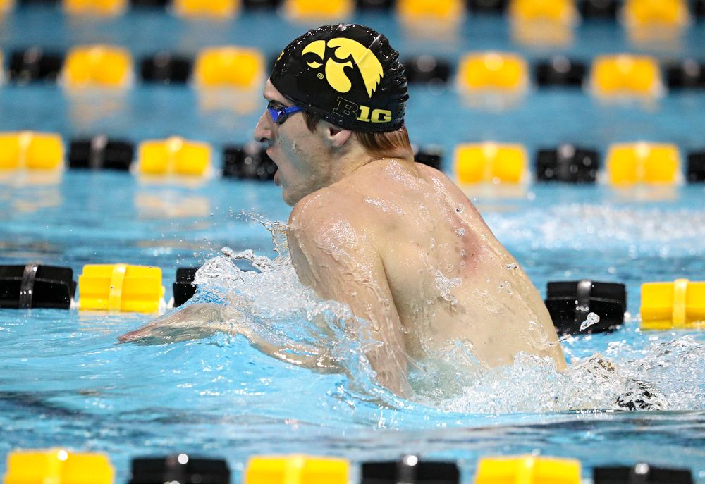 Iowa’s Joe Myhre swims the breaststroke section of the 100-yard individual medley event during their meet against Michigan State at the Campus Recreation and Wellness Center in Iowa City on Thursday, Oct 3, 2019. (Stephen Mally/hawkeyesports.com)
