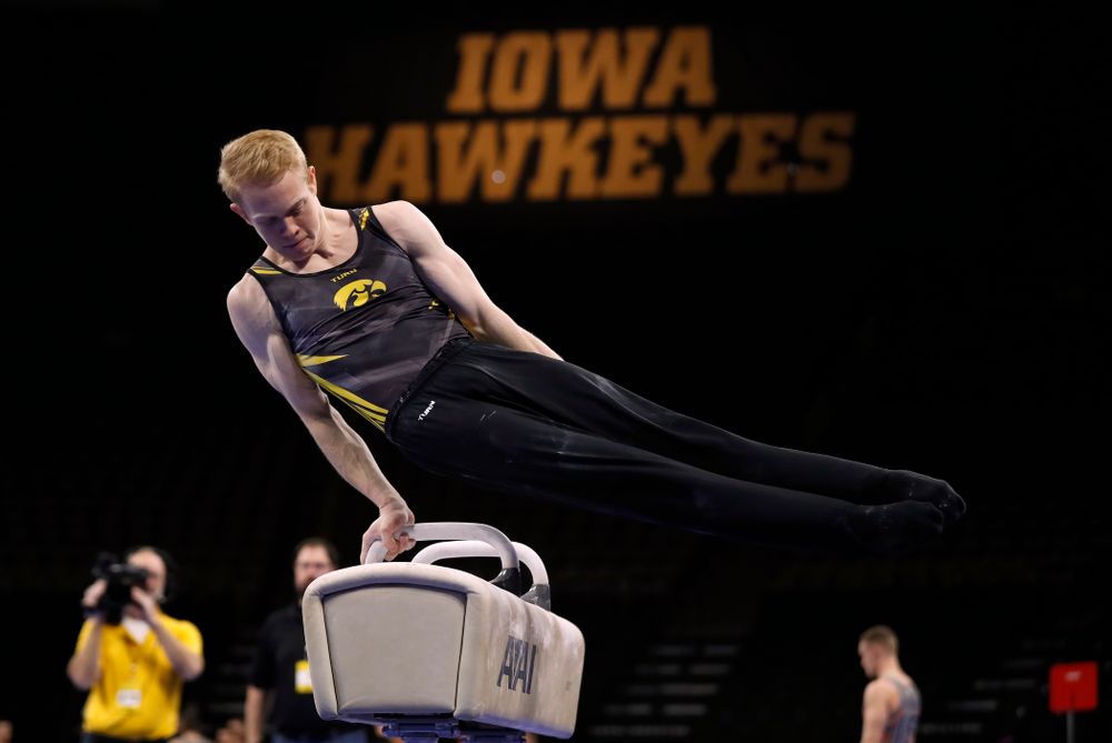 Nick Merryman competes on the pommel horse against Illinois 