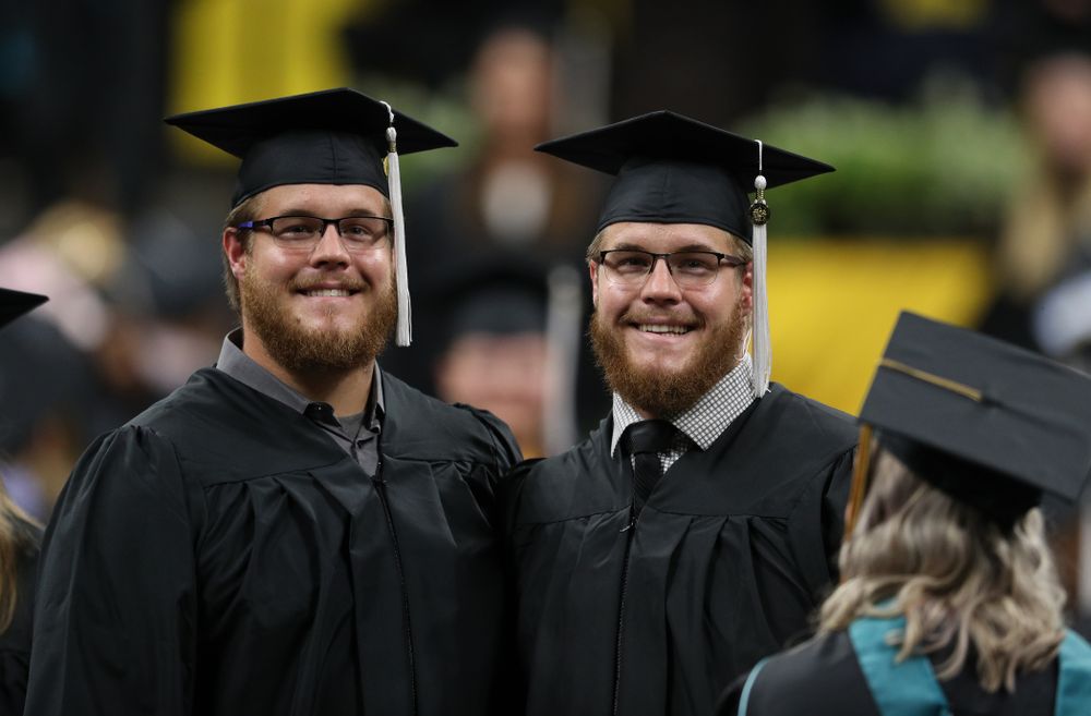 Hawkeye FootballÕs Landan and Levi Paulsen during the College of Liberal Arts and Sciences spring commencement Saturday, May 11, 2019 at Carver-Hawkeye Arena. (Brian Ray/hawkeyesports.com)