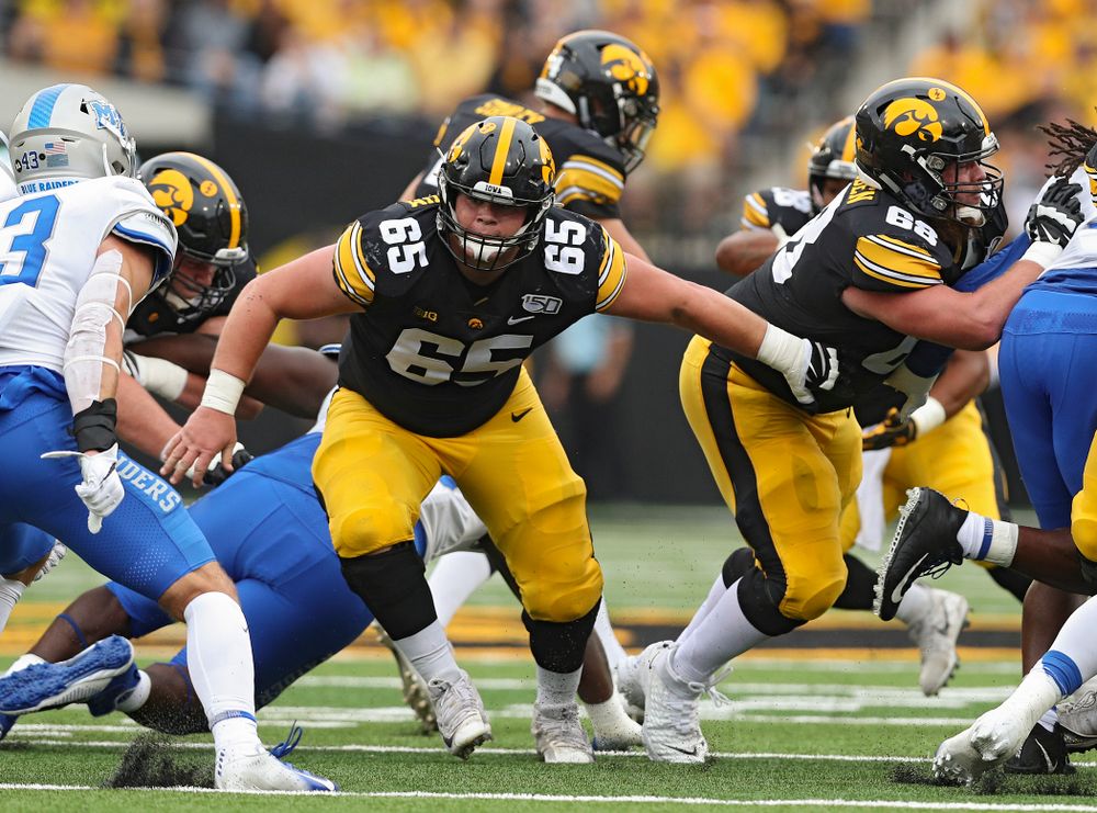 Iowa Hawkeyes offensive lineman Tyler Linderbaum (65) looks to block during the first quarter of their game at Kinnick Stadium in Iowa City on Saturday, Sep 28, 2019. (Stephen Mally/hawkeyesports.com)