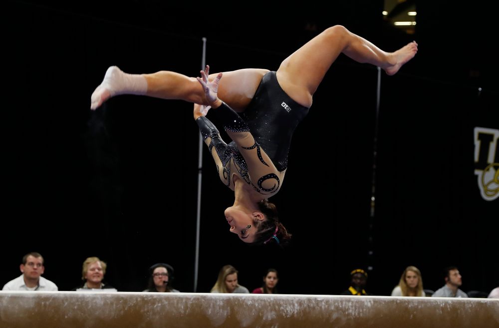 Iowa's Nikki Youd competes on the beam