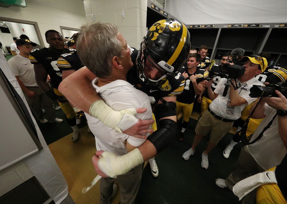 Iowa Hawkeyes head coach Kirk Ferentz and defensive end Matt Nelson (96) during their Outback Bowl Tuesday, January 1, 2019 at Raymond James Stadium in Tampa, FL. (Brian Ray/hawkeyesports.com)