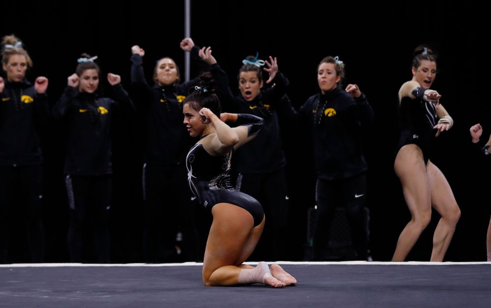 Iowa's Nikki Youd competes on the floor against the Nebraska Cornhuskers 