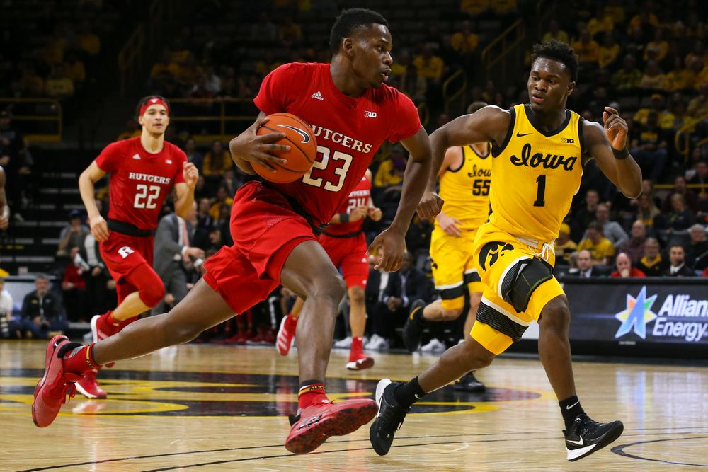 Iowa Hawkeyes guard Joe Toussaint (1) follows Rutgers guard Montez Mathis during the Iowa men’s basketball game vs Rutgers on Wednesday, January 22, 2020 at Carver-Hawkeye Arena. (Lily Smith/hawkeyesports.com)