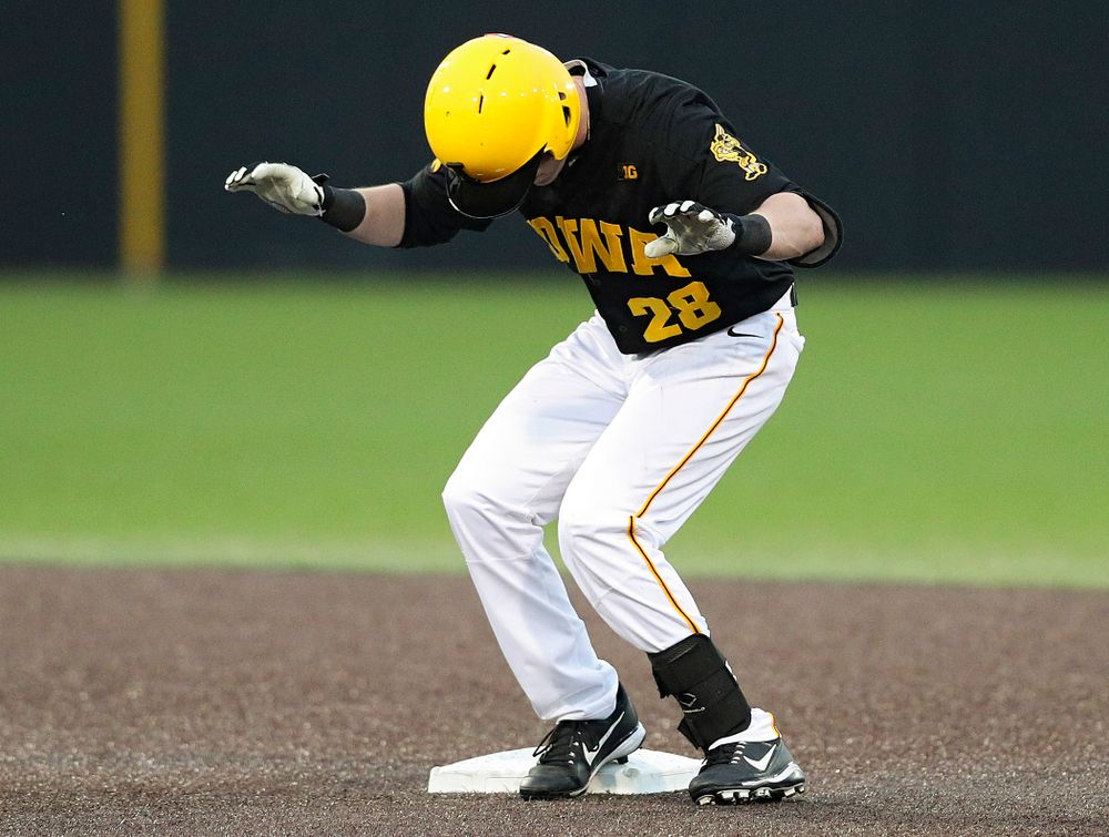 Iowa Hawkeyes left fielder Chris Whelan (28) dances on second base after hitting a double during the fourth inning of their game against Western Illinois at Duane Banks Field in Iowa City on Wednesday, May. 1, 2019. (Stephen Mally/hawkeyesports.com)