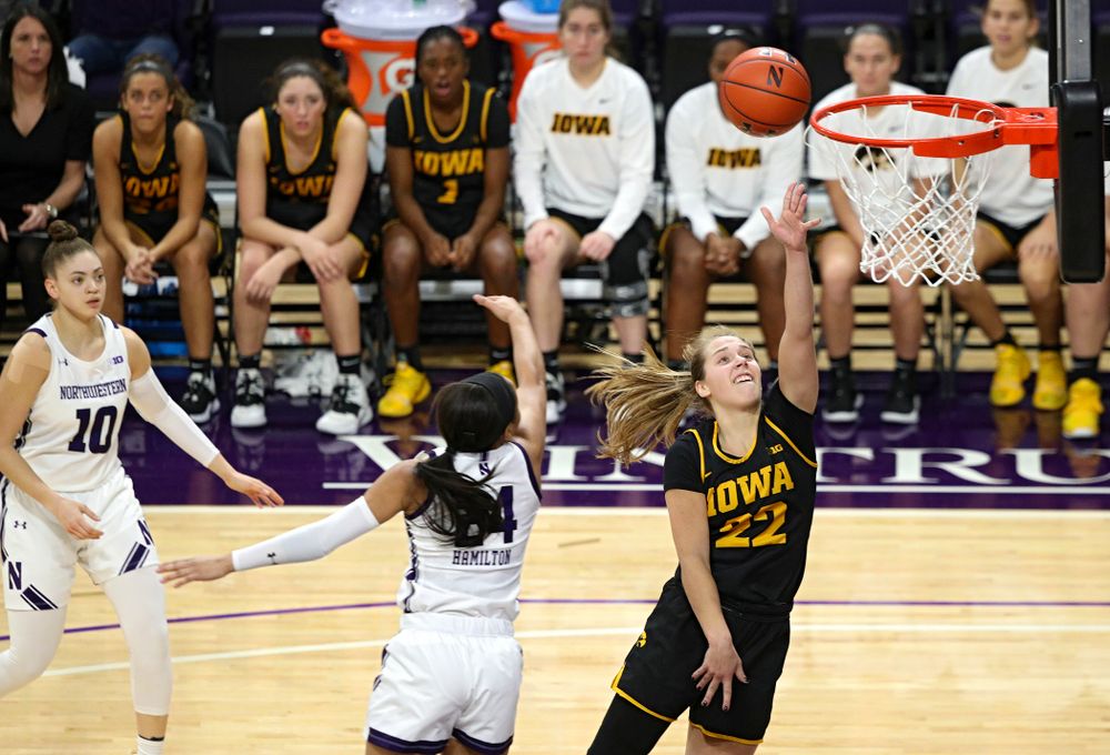 Iowa Hawkeyes guard Kathleen Doyle (22) makes a basket during the fourth quarter of their game at Welsh-Ryan Arena in Evanston, Ill. on Sunday, January 5, 2020. (Stephen Mally/hawkeyesports.com)