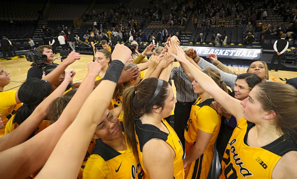 The Hawkeyes huddle after winning their game against Winona State at Carver-Hawkeye Arena in Iowa City on Sunday, Nov 3, 2019. (Stephen Mally/hawkeyesports.com)