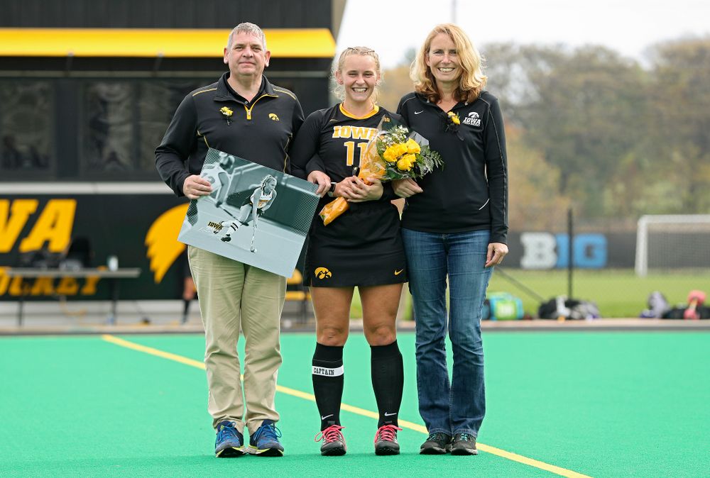 Iowa’s Katie Birch (11) in honored with her parents on Senior Day before their game at Grant Field in Iowa City on Saturday, Oct 26, 2019. (Stephen Mally/hawkeyesports.com)