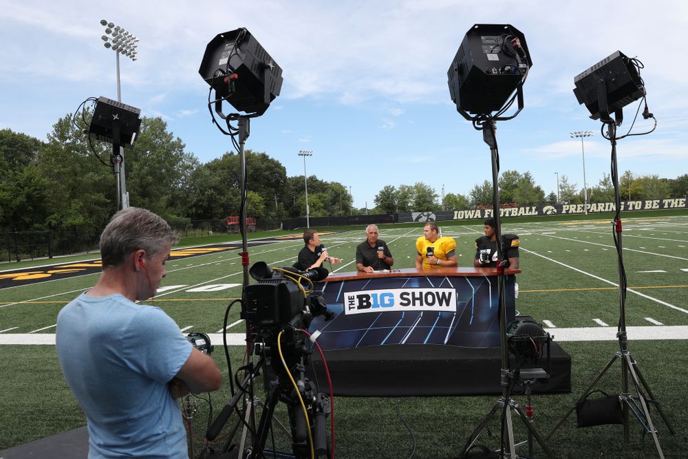 Iowa Hawkeyes quarterback Nate Stanley (4) and offensive lineman Tristan Wirfs (74) on the set of the BTN Tailgate Tour following fall camp Practice No. 16 Tuesday, August 20, 2019 at the Ronald D. and Margaret L. Kenyon Football Practice Facility. (Brian Ray/hawkeyesports.com)
