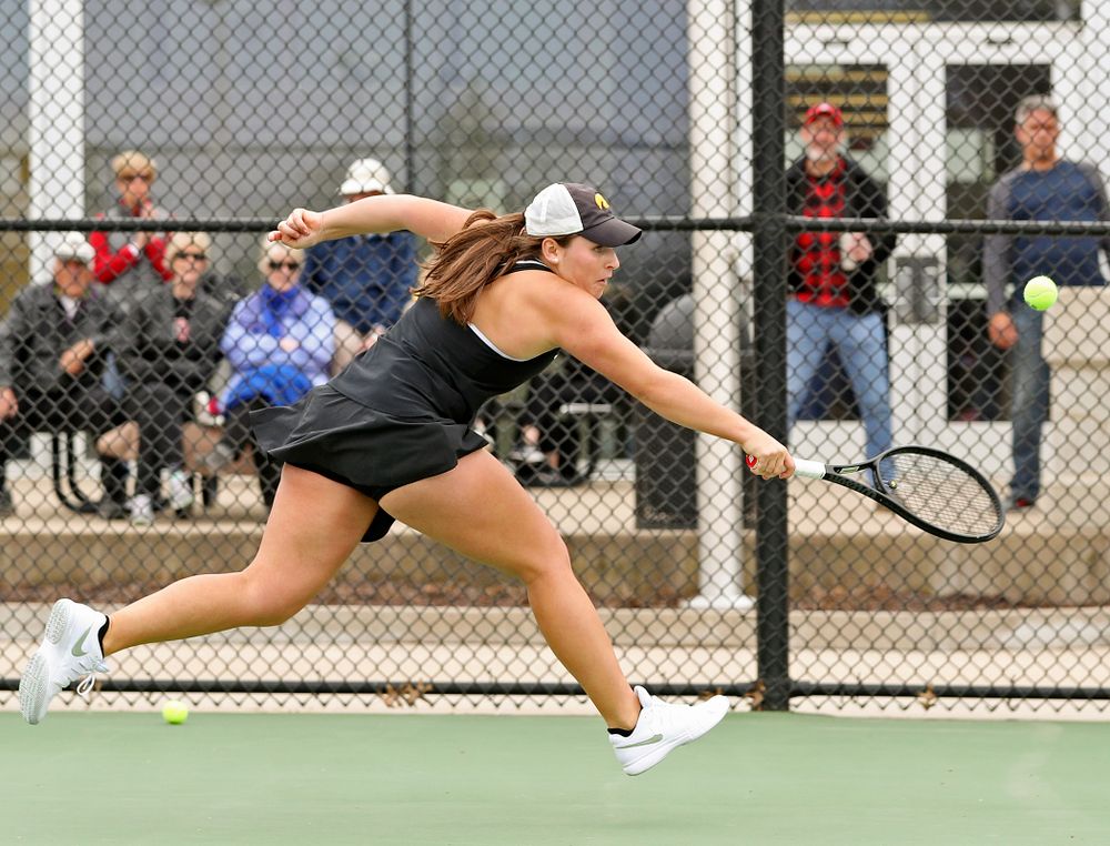 Iowa's Danielle Bauers runs down a ball during their doubles match against Rutgers at the Hawkeye Tennis and Recreation Complex in Iowa City on Friday, Apr. 5, 2019. (Stephen Mally/hawkeyesports.com)