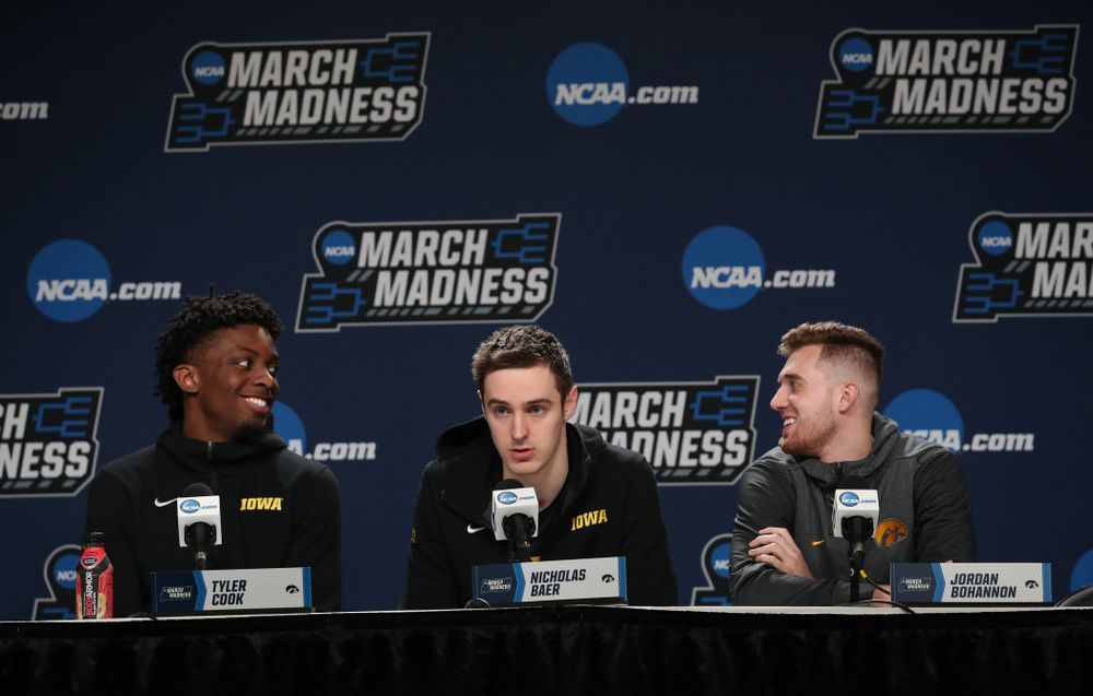 Iowa Hawkeyes forward Tyler Cook (25), forward Nicholas Baer (51), and guard Jordan Bohannon (3) during press availability and practice before the first round of the 2019 NCAA Men's Basketball Tournament Thursday, March 21, 2019 at Nationwide Arena in Columbus, Ohio. (Brian Ray/hawkeyesports.com)