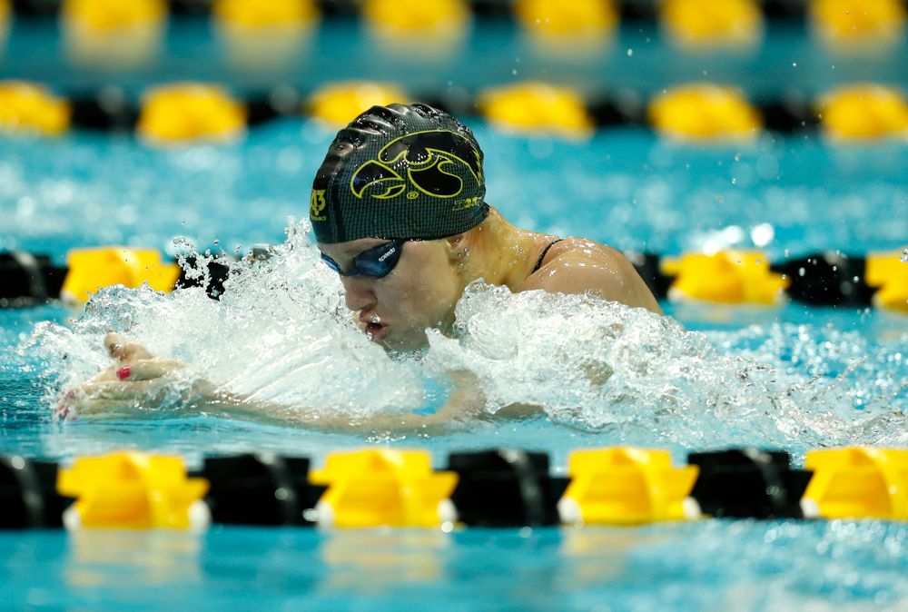 Iowa's Sage Ohlensehlen swims the 100 yard breaststroke 