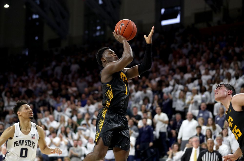 Iowa Hawkeyes guard Joe Toussaint (1) goes to the hoop against Penn State Saturday, January 4, 2020 at the Palestra in Philadelphia. (Brian Ray/hawkeyesports.com)