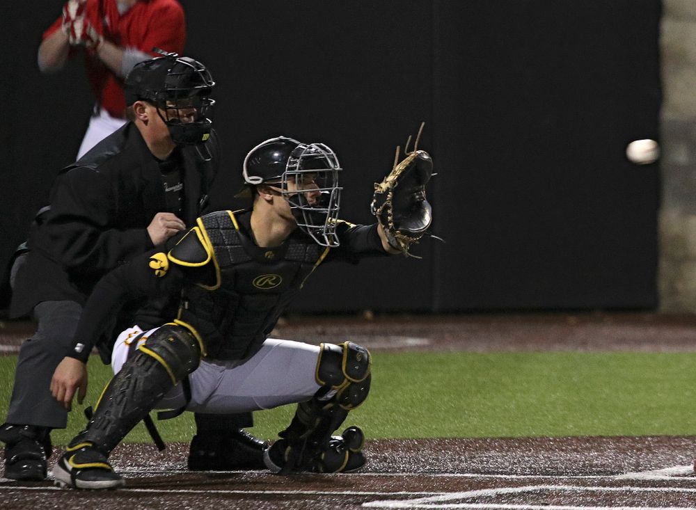 Iowa catcher Tyler Snep (16) looks in a throw during the eighth inning of their game at Duane Banks Field in Iowa City on Tuesday, March 3, 2020. (Stephen Mally/hawkeyesports.com)