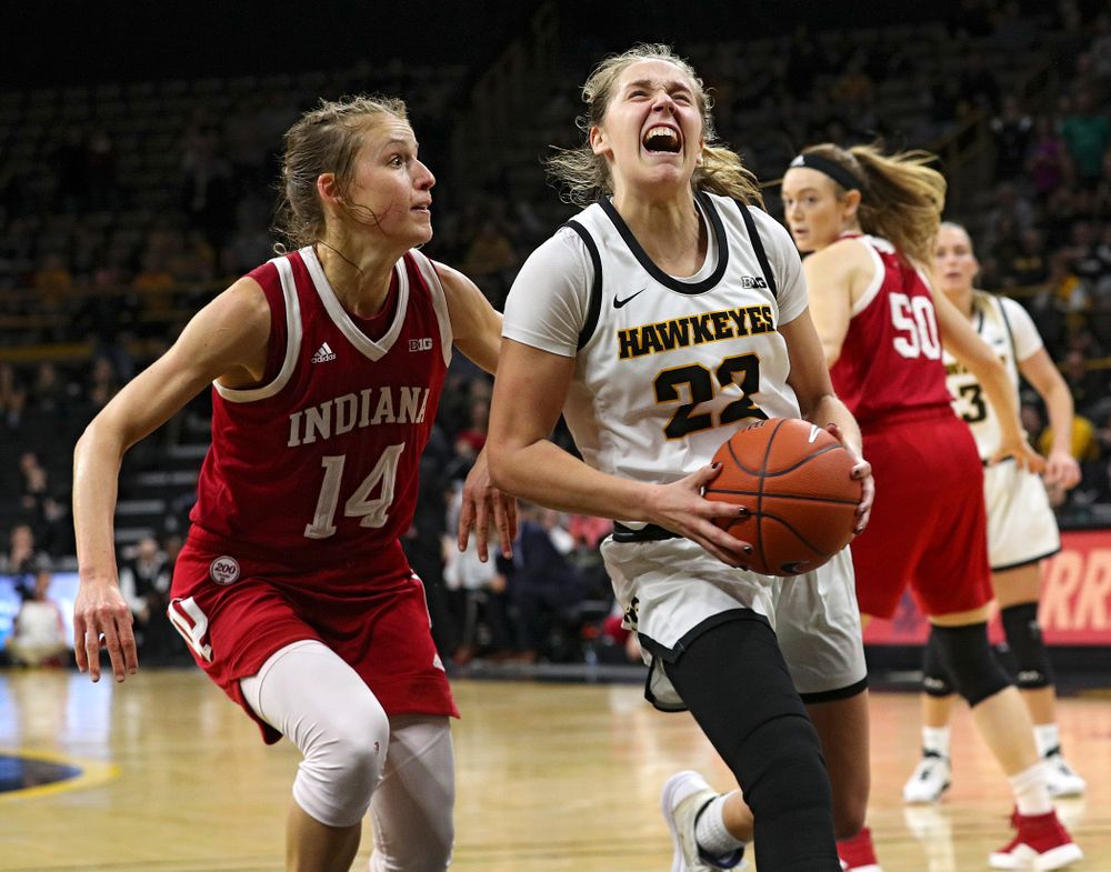 Iowa Hawkeyes guard Kathleen Doyle (22) drives to the basket and scores during the second overtime period of their game at Carver-Hawkeye Arena in Iowa City on Sunday, January 12, 2020. (Stephen Mally/hawkeyesports.com)