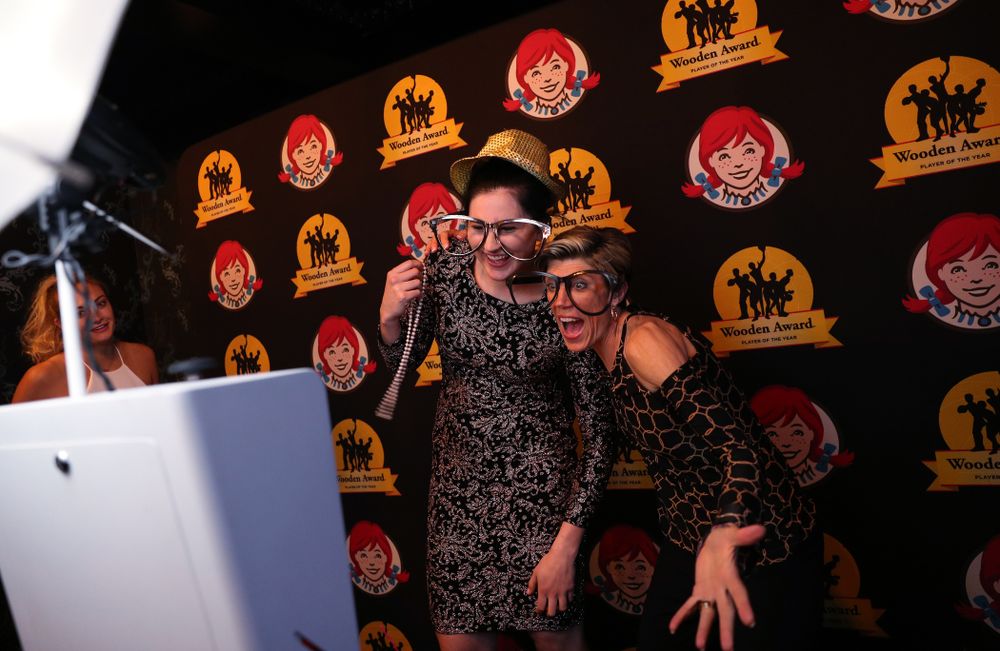 Iowa Hawkeyes forward Megan Gustafson (10) and associate head coach Jan Jensen in the photo booth at the after party for the ESPN College Basketball Awards show Friday, April 12, 2019 at The Novo at LA Live.  (Brian Ray/hawkeyesports.com)