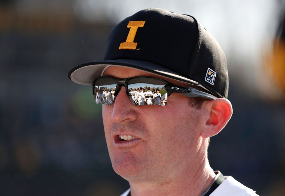 against the Iowa Hawkeyes associate head coach Marty Sutherland against the Michigan Wolverines Friday, April 27, 2018 at Duane Banks Field in Iowa City. (Brian Ray/hawkeyesports.com)