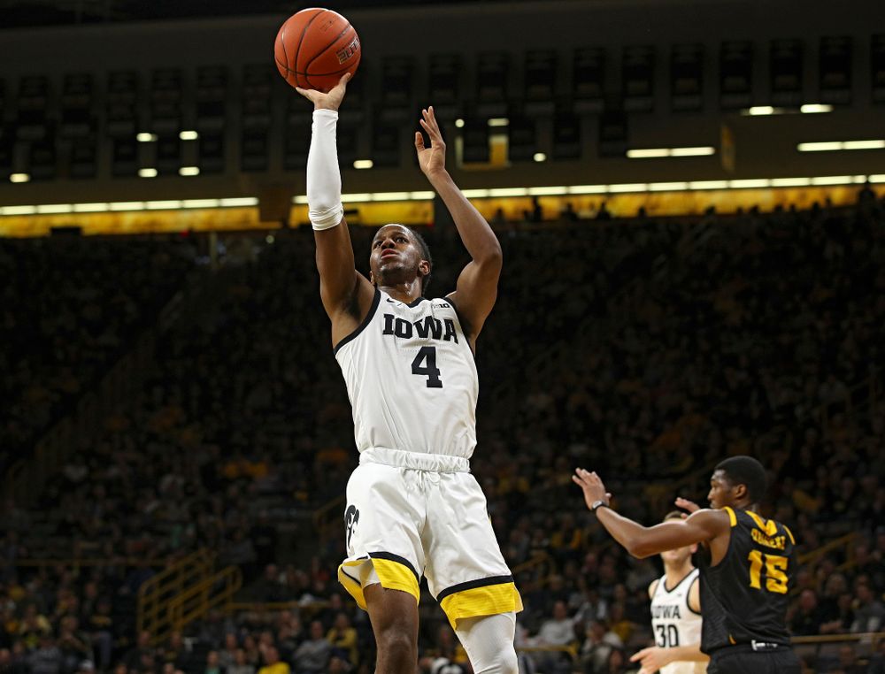 Iowa Hawkeyes guard Bakari Evelyn (4) puts up a shot during the first half of their their game at Carver-Hawkeye Arena in Iowa City on Sunday, December 29, 2019. (Stephen Mally/hawkeyesports.com)