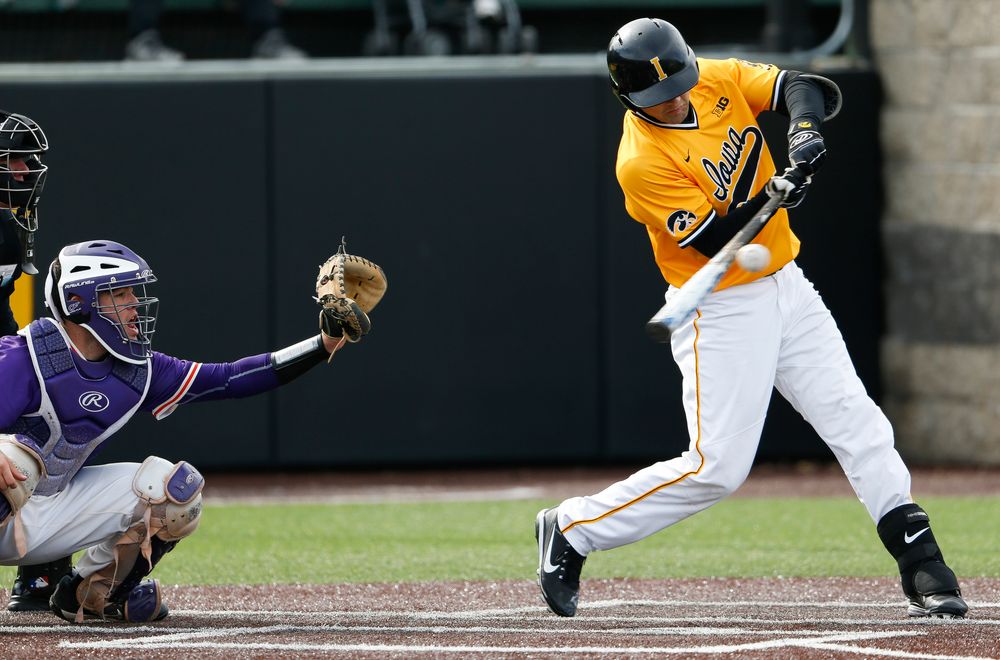 Iowa Hawkeyes infielder Kyle Crowl (23) swings at a pitch during a game against Evansville at Duane Banks Field on March 18, 2018. (Tork Mason/hawkeyesports.com)
