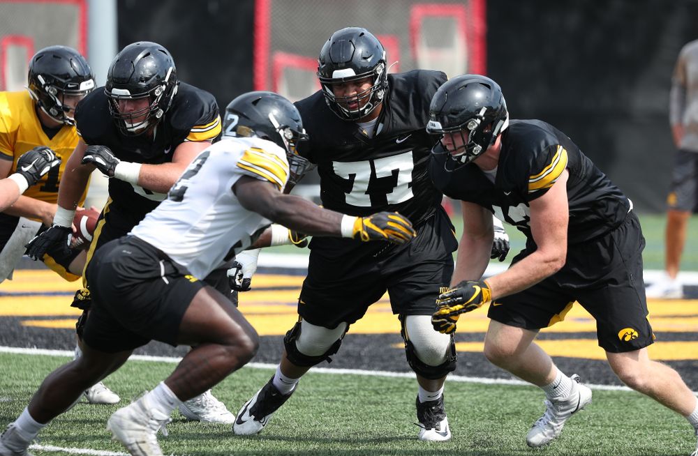 Iowa Hawkeyes offensive lineman Alaric Jackson (77) during Fall Camp Practice No. 4 Monday, August 5, 2019 at the Ronald D. and Margaret L. Kenyon Football Practice Facility. (Brian Ray/hawkeyesports.com)