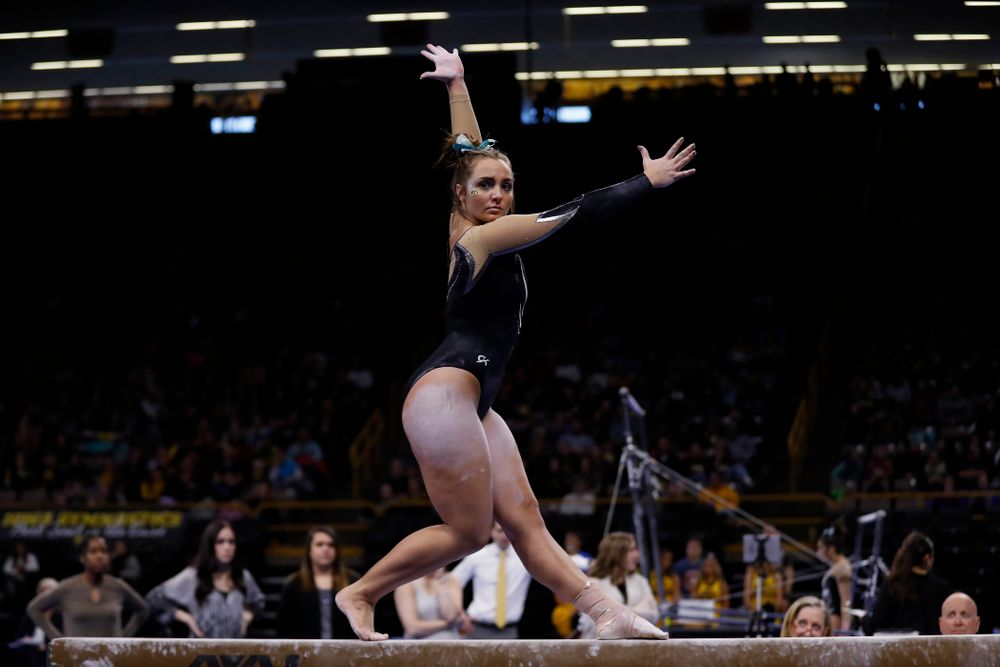 Iowa's Bre Fitzke competes on the beam against the Nebraska Cornhuskers 