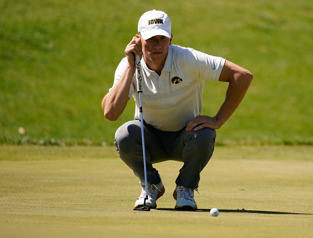 Iowa's Aaron DeNucci lines up a putt during the second round of the Hawkeye Invitational at Finkbine Golf Course in Iowa City on Saturday, Apr. 20, 2019. (Stephen Mally/hawkeyesports.com)