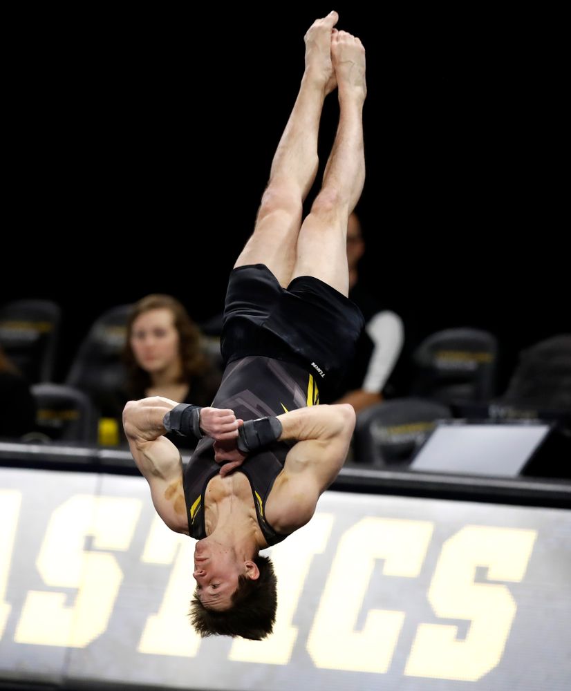 Iowa's Mark Springett competes on the floor 
