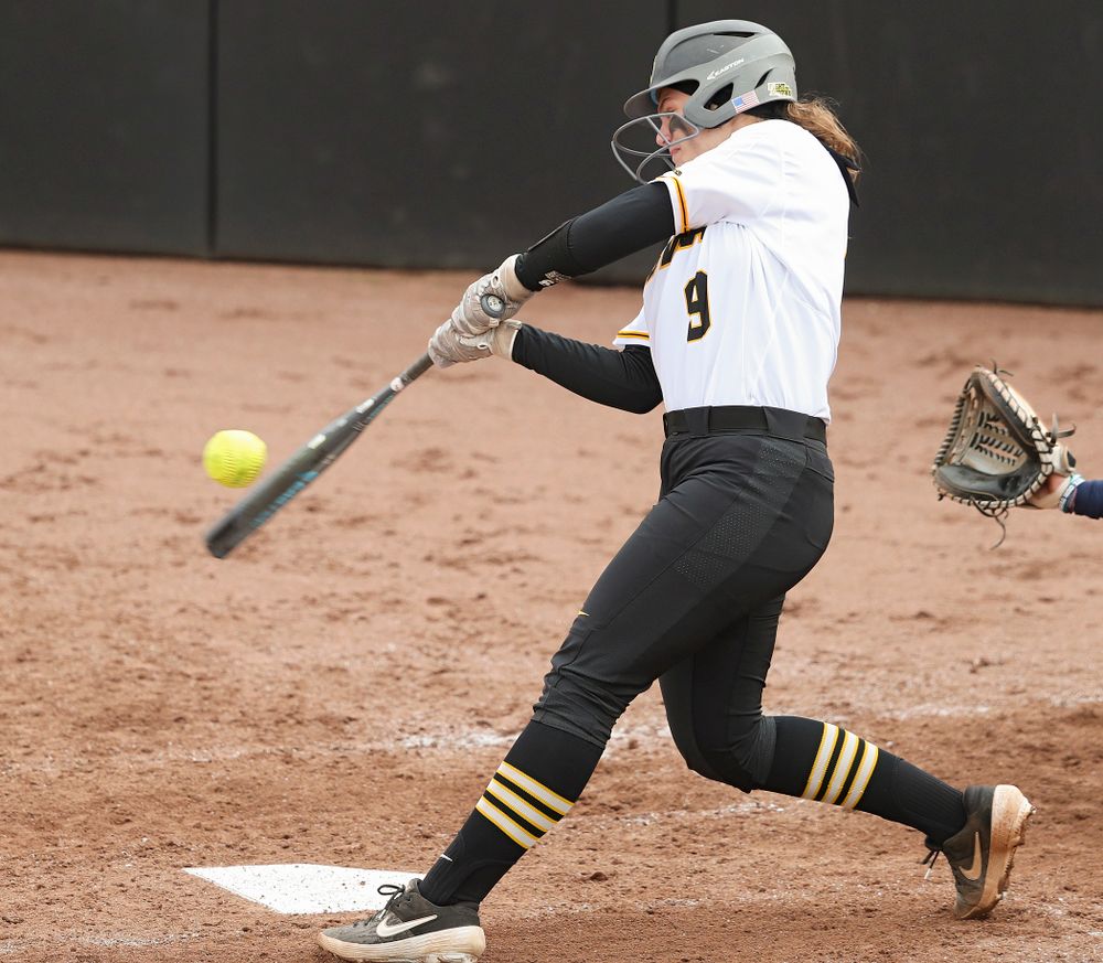 Iowa catcher Abby Lien (9) bats during the fourth inning of their game against Illinois at Pearl Field in Iowa City on Friday, Apr. 12, 2019. (Stephen Mally/hawkeyesports.com)