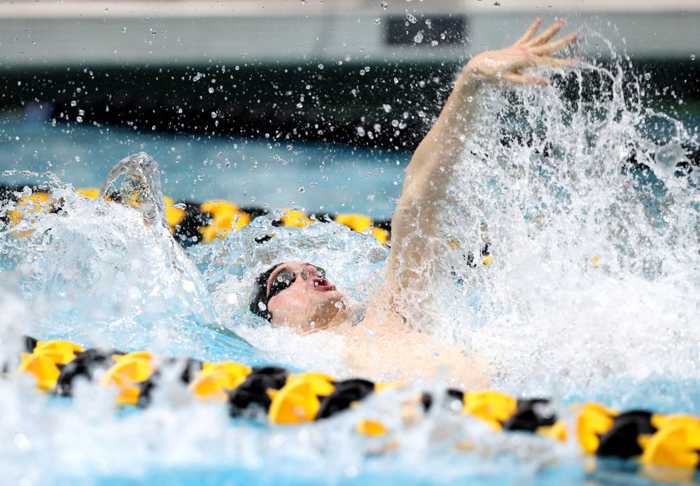 Iowa's Kenneth Mende swims the backstroke leg of the 200 medley relay at the 2019 Big Ten Swimming and Diving meet  Wednesday, February 27, 2019 at the Campus Wellness and Recreation Center. (Brian Ray/hawkeyesports.com)