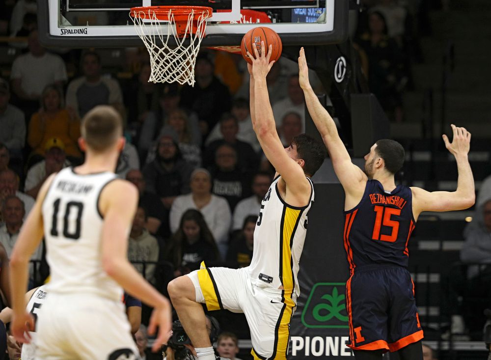 Iowa Hawkeyes center Luka Garza (55) dunks the ball during the second half of the game at Carver-Hawkeye Arena in Iowa City on Sunday, February 2, 2020. (Stephen Mally/hawkeyesports.com)