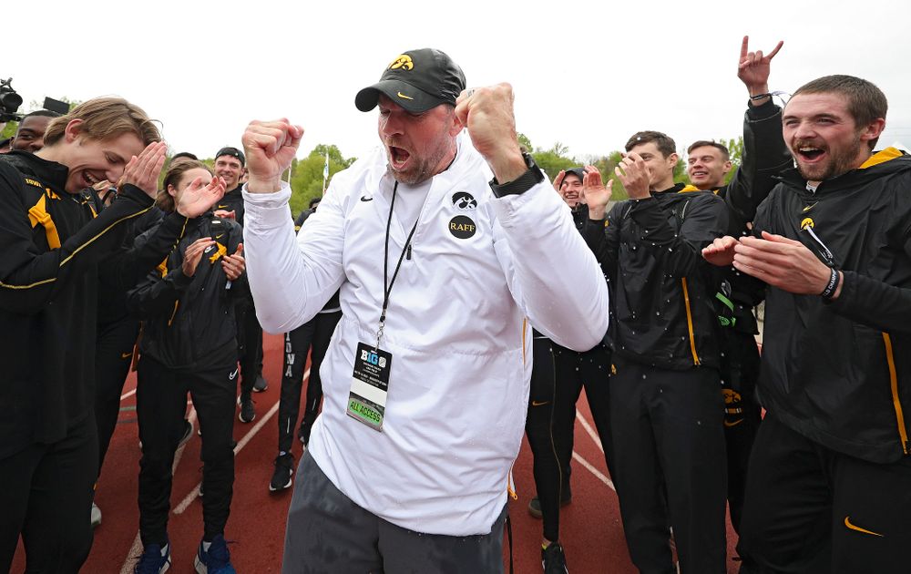 Iowa Director of Track and Field Joey Woody celebrates with his team after winning the Men's Big Ten Outdoor Track and Field Championships on the third day of the Big Ten Outdoor Track and Field Championships at Francis X. Cretzmeyer Track in Iowa City on Sunday, May. 12, 2019. (Stephen Mally/hawkeyesports.com)