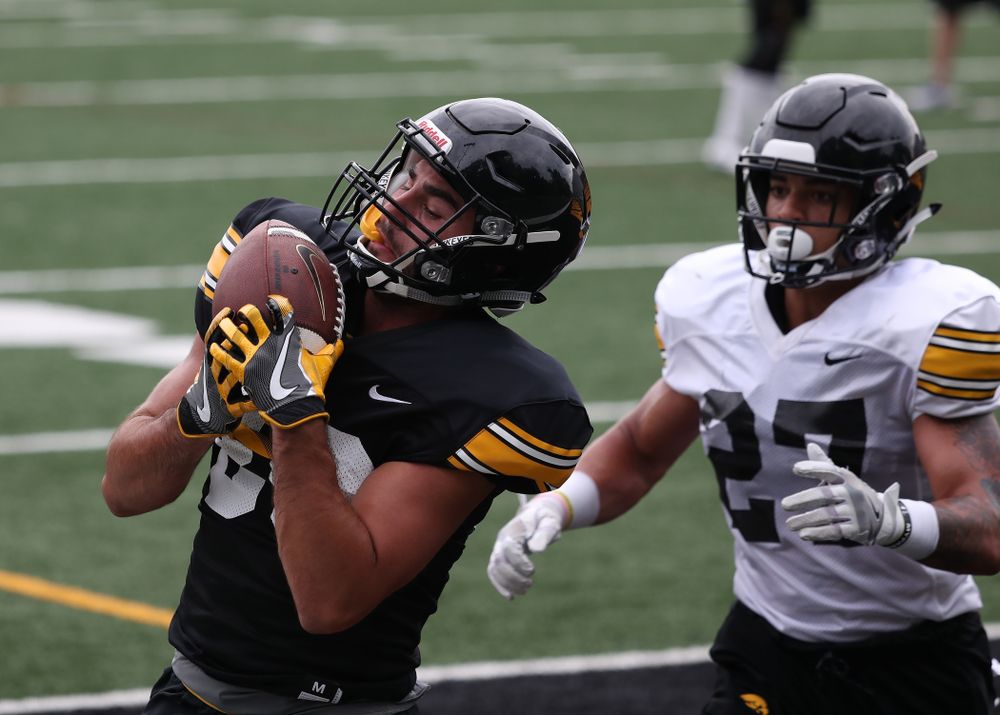 Iowa Hawkeyes wide receiver Nico Ragaini (89) and defensive back Amani Hooker (27) during practice No. 4 of Fall Camp Monday, August 6, 2018 at the Hansen Football Performance Center. (Brian Ray/hawkeyesports.com)