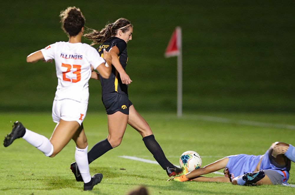 Iowa forward Kaleigh Haus (4) scores a goal during the second half of their match against Illinois at the Iowa Soccer Complex in Iowa City on Thursday, Sep 26, 2019. (Stephen Mally/hawkeyesports.com)
