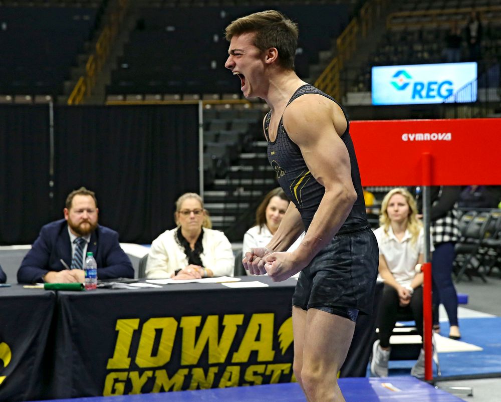 Iowa's Mitch Mandozzi competes in the vault against Ohio State at Caver-Hawkeye Arena in Iowa City on Saturday, Mar. 16, 2019. (Stephen Mally for HawkeyeSports.com)