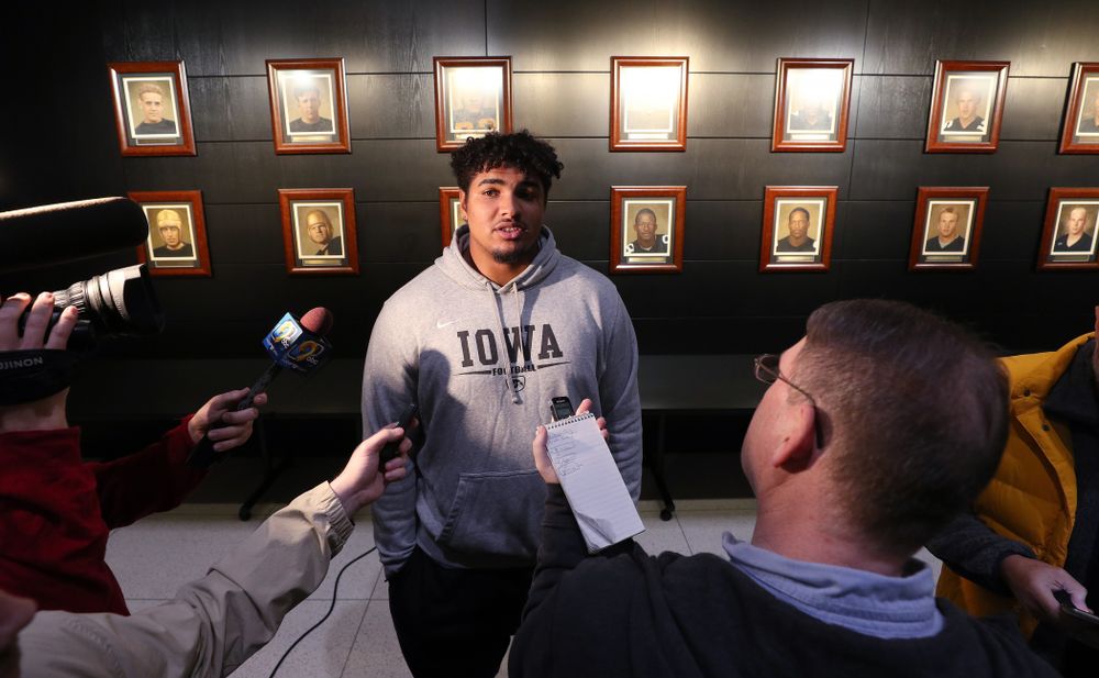 Iowa Hawkeyes offensive lineman Tristan Wirfs (74) answers questions from the media on the Hawkeyes selection to face USC in the 2019 Holiday Bowl Sunday, December 8, 2019 at the Hansen Football Performance Center. (Brian Ray/hawkeyesports.com)
