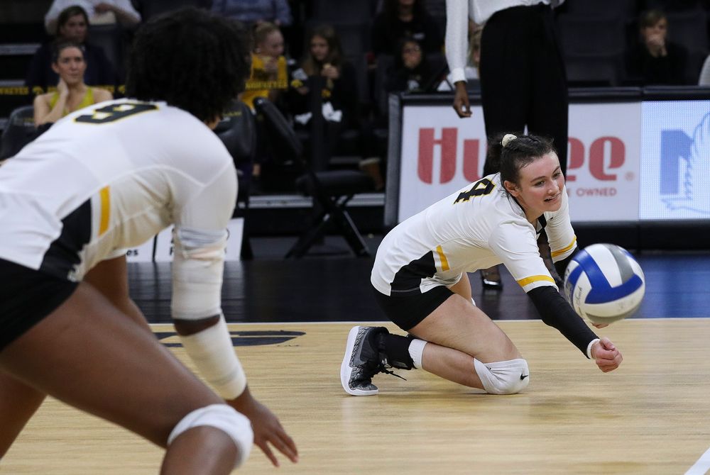 Iowa Hawkeyes defensive specialist Halle Johnston (4) dives for the ball during a match against Penn State at Carver-Hawkeye Arena on November 3, 2018. (Tork Mason/hawkeyesports.com)