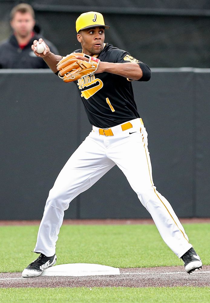 Iowa Hawkeyes third baseman Lorenzo Elion (1) throws to second base to complete a double play during the third inning of their game against Illinois State at Duane Banks Field in Iowa City on Wednesday, Apr. 3, 2019. (Stephen Mally/hawkeyesports.com)